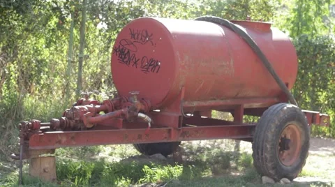 Rusty barrel on wheels Stock Footage 68991363