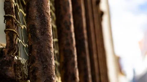 Rusty bars of a jail Stock Photos