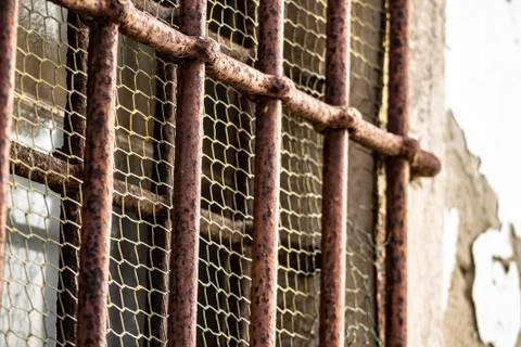 Rusty bars of a jail Stock Photos