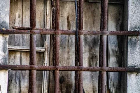 Rusty bars of a jail Stock Photos