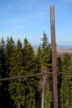 Rusty bars of old barrier on trail in mountains Stock Photos