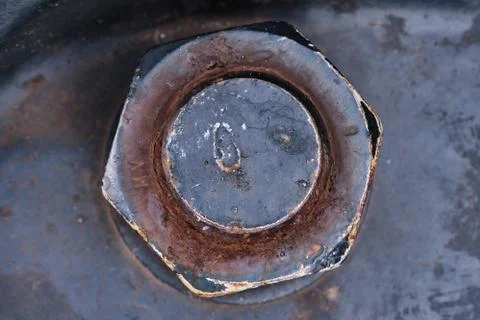 Rusty big nut with a bolt as background Stock-Fotos