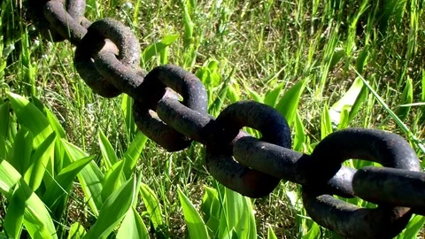 Rusty black heavy cast iron chain. Stock Footage 75923639