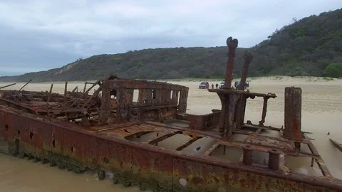 Rusty boat on shore shot Stock Footage 79703933