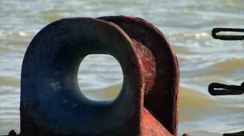 Rusty bolder in the harbor Stock Footage 8836602