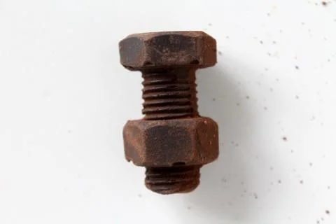 Rusty bolt and nut made of chocolate isolated on white background Stock Photos