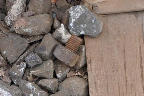 A rusty bolt on the ground Stock Photos