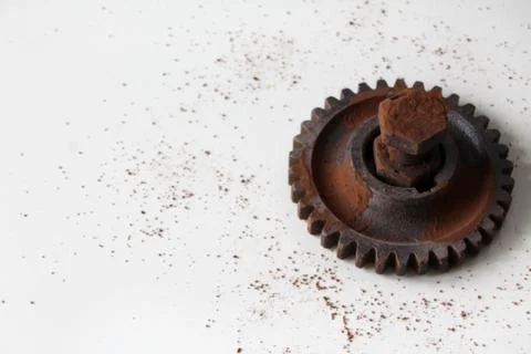 Rusty bolt, nut and gear wheel made of chocolate isolated on white background Stock Photos