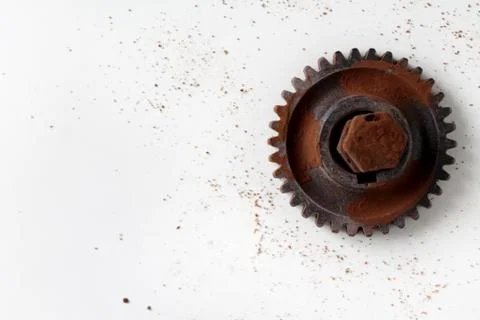 Rusty bolt, nut and gear wheel made of chocolate isolated on white background Stock Photos