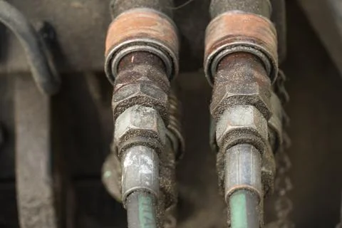 Rusty bolts and nuts of pipeline Stock Photos