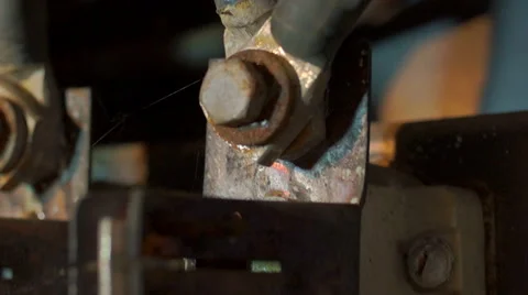 Rusty bolts sliding down fuses Stockbeeldmateriaal 45588324