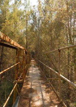 The rusty bridge to the other side Stock Photos