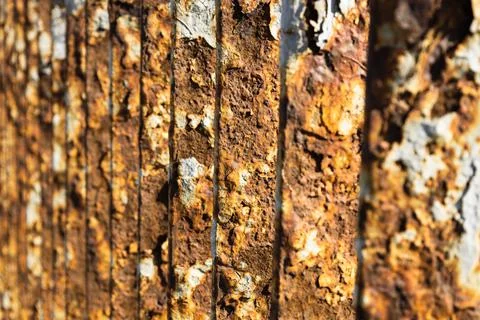 Rusty bridge railing texture background with cracked white paint Stock-Fotos