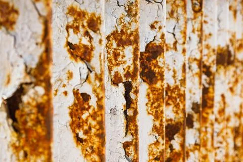 Rusty bridge railing texture background with cracked white paint Stock Photos