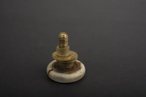 Rusty broken shower door roller. Maintenance concept Stock Photos