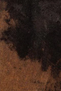 Rusty brown stained background, old grungy iron surface 写真素材
