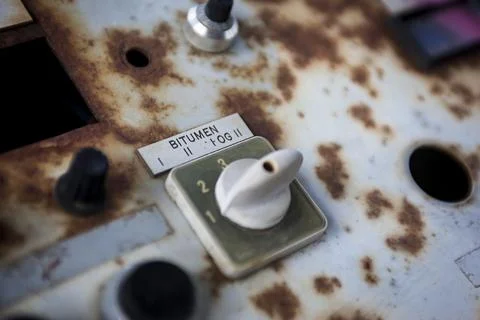 Rusty buttons on a old rustic machine Stock Photos
