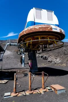 Rusty cable car station structure on Mount Etna Фото