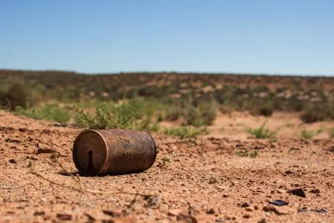Rusty can in desert Stock Photos
