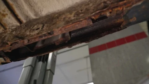 Rusty car bottom Stock Footage 104832097