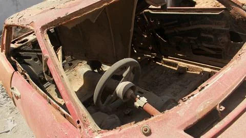 Rusty car wrecked interior, broken and missing cabin parts. old abandoned c.. Fotos de archivo