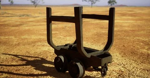 Rusty cart stands alone on dry desert landscape under clear sky 스톡 일러스트
