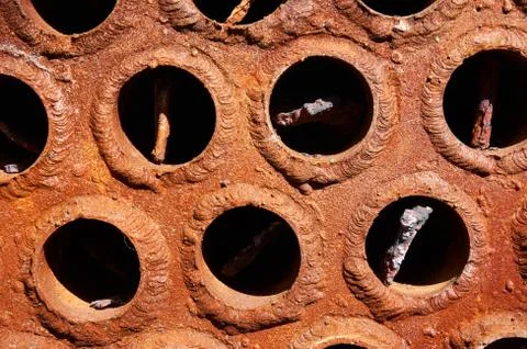 Rusty cauldron pipes . Abstract background. Stock Photos