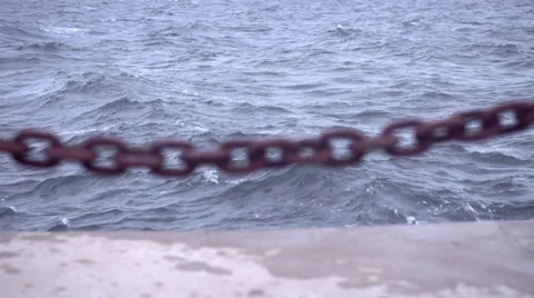 Rusty Chain Beside Water Stock Footage 65095919