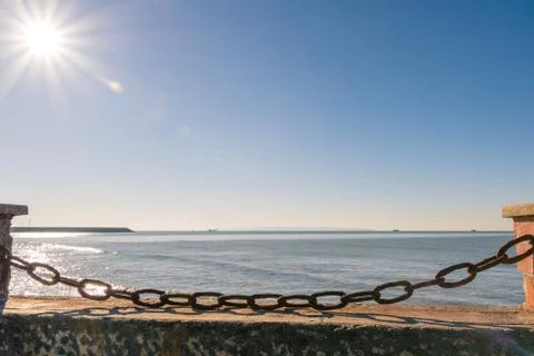 Rusty chain blocking the beach Stock Photos