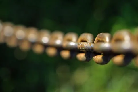 Rusty chain with blurred background Stock Photos