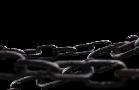 Rusty chain isolated on black background. Stock Photos