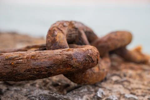 Rusty chain links emphasizing texture, corrosion, and the passage of time Stock Photos