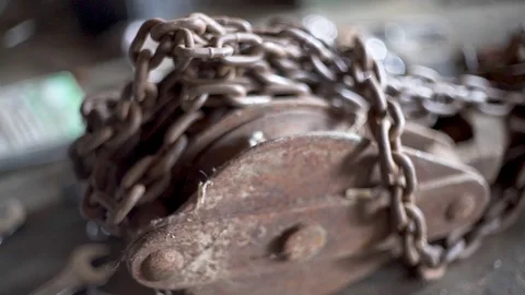 Rusty chain in old workshop Part 3 Stock Footage