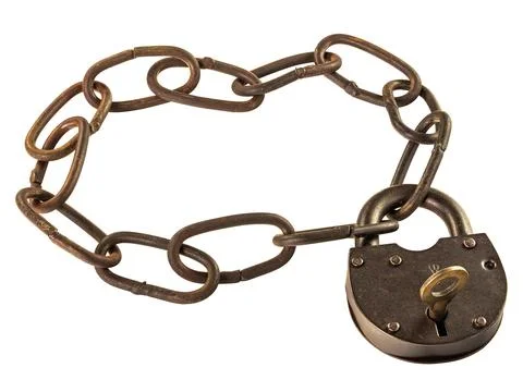 Rusty chain is padlocked with a keyed padlock isolated on a white Stock Photos