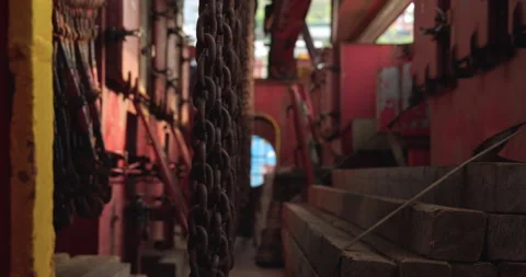 Rusty chains bunch near construction materials on cargo ship Stock Footage 320454364