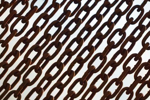 Rusty chains isolated on white. black and white concept. Background of chains on Stock Photos