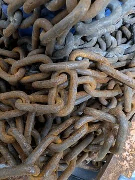 Rusty Chains Overview. Corroded Metal Chains With Industrial Ambiance 库存照片