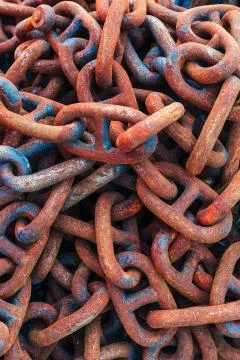 Rusty corroded shackles piled up Stock Photos