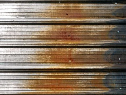 Rusty Corrugated Metal Sheet Texture with Scratches and Screws Stock Photos