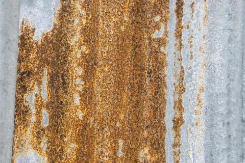 Rusty corrugated metal wall ,rusty Zinc grunge background. Stock Photos