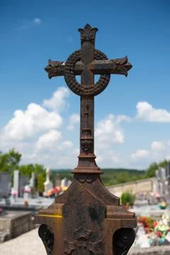 Rusty cross on cemetery Stock Photos
