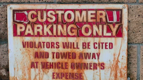 Rusty Customer Parking Only Sign Stock Footage 237842637