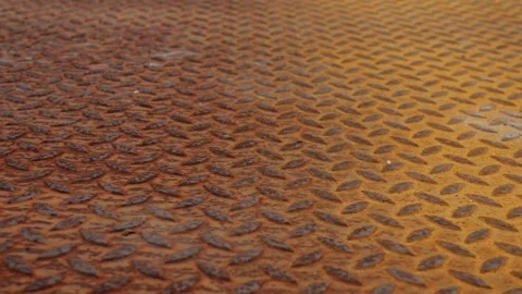 Rusty Diamond Plate Metal Floor Deep Red Brown Dramatic 스톡 동영상 337925856