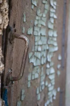 Rusty doorknob. Old door handle. Stock Photos