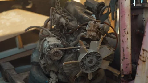 Rusty, dusty, and greasy internal combustion engine parts needing repair Stock Footage 330952863