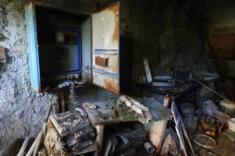 Rusty Electrical Box and Tools in Abandoned Room Stock Photos