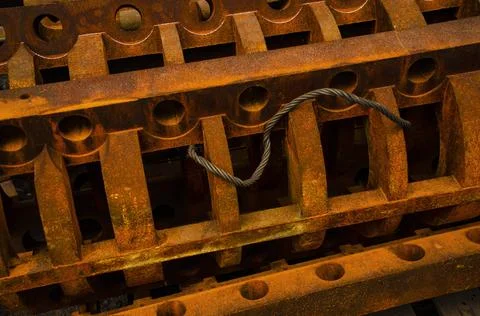 Rusty elements background. Orange brown rusted Ingots of a heavy metal. Details Stock Photos