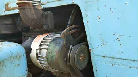 The rusty engine of the blue harvester in the farm Stock Footage 115639657