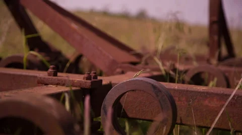 Rusty Equipment in a Field 3 Stock Footage 51440082