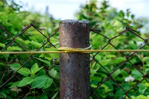 Rusty fence post. Stock Photos